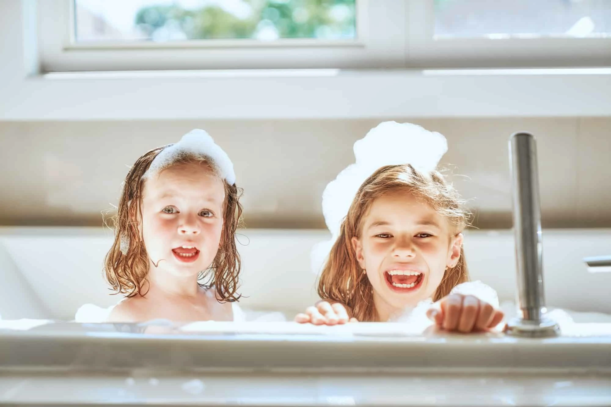children are bathing in a bath