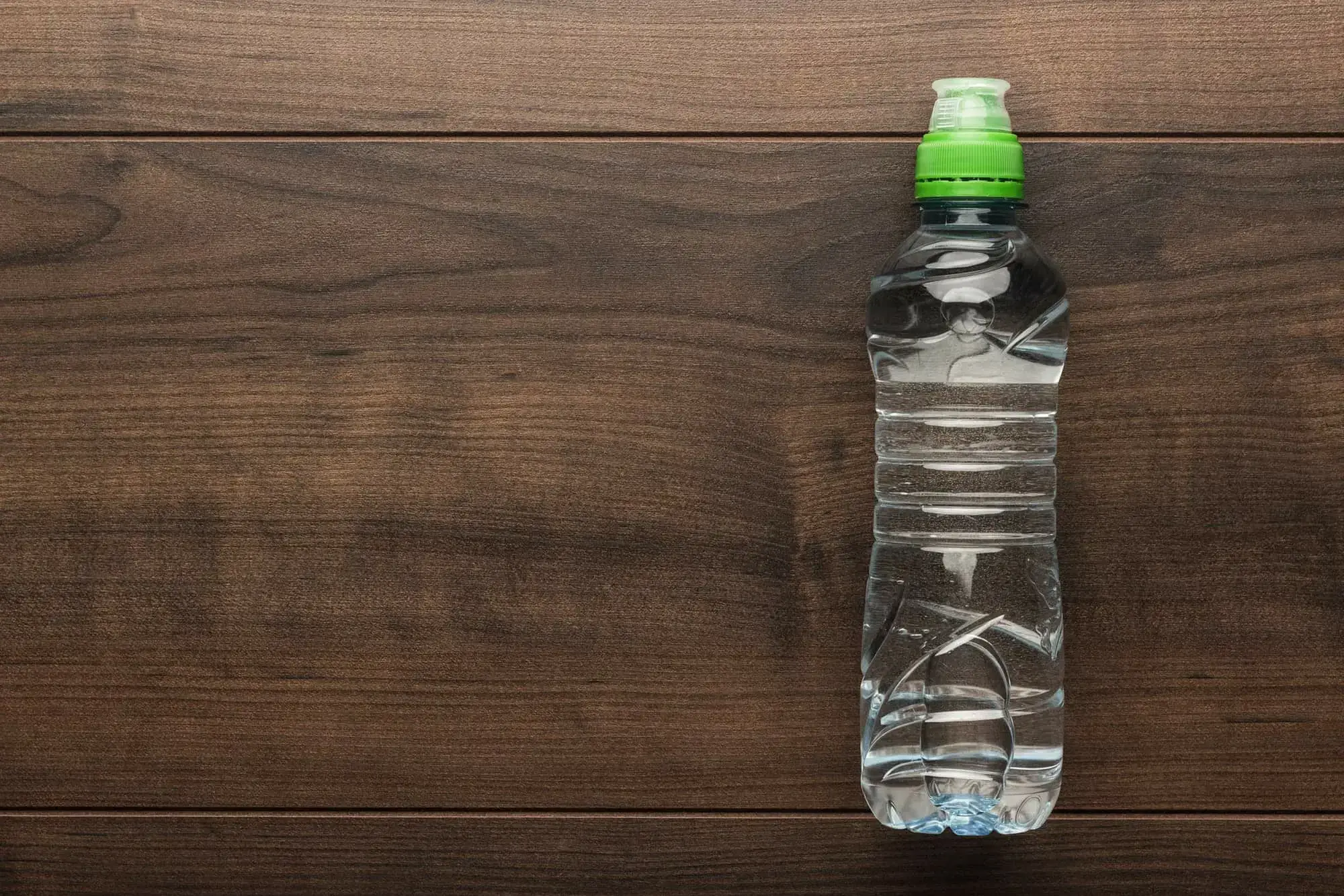 Plastic Water Bottle On The Table