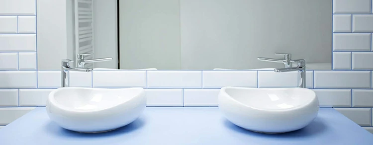 Symmetrical washbasins in bathroom