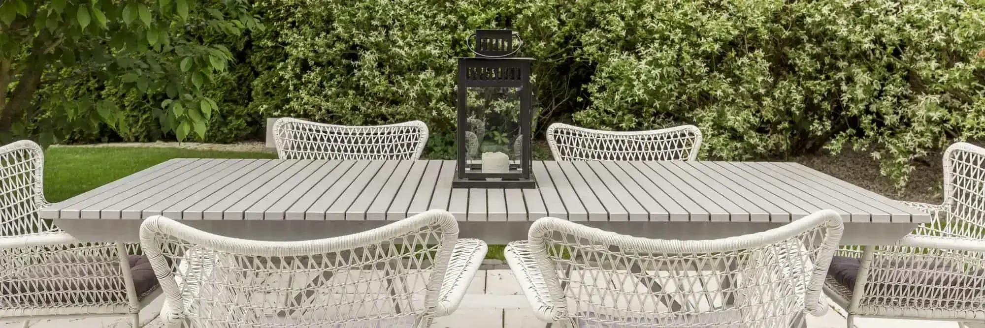 Terrace in the garden with patio chairs and table